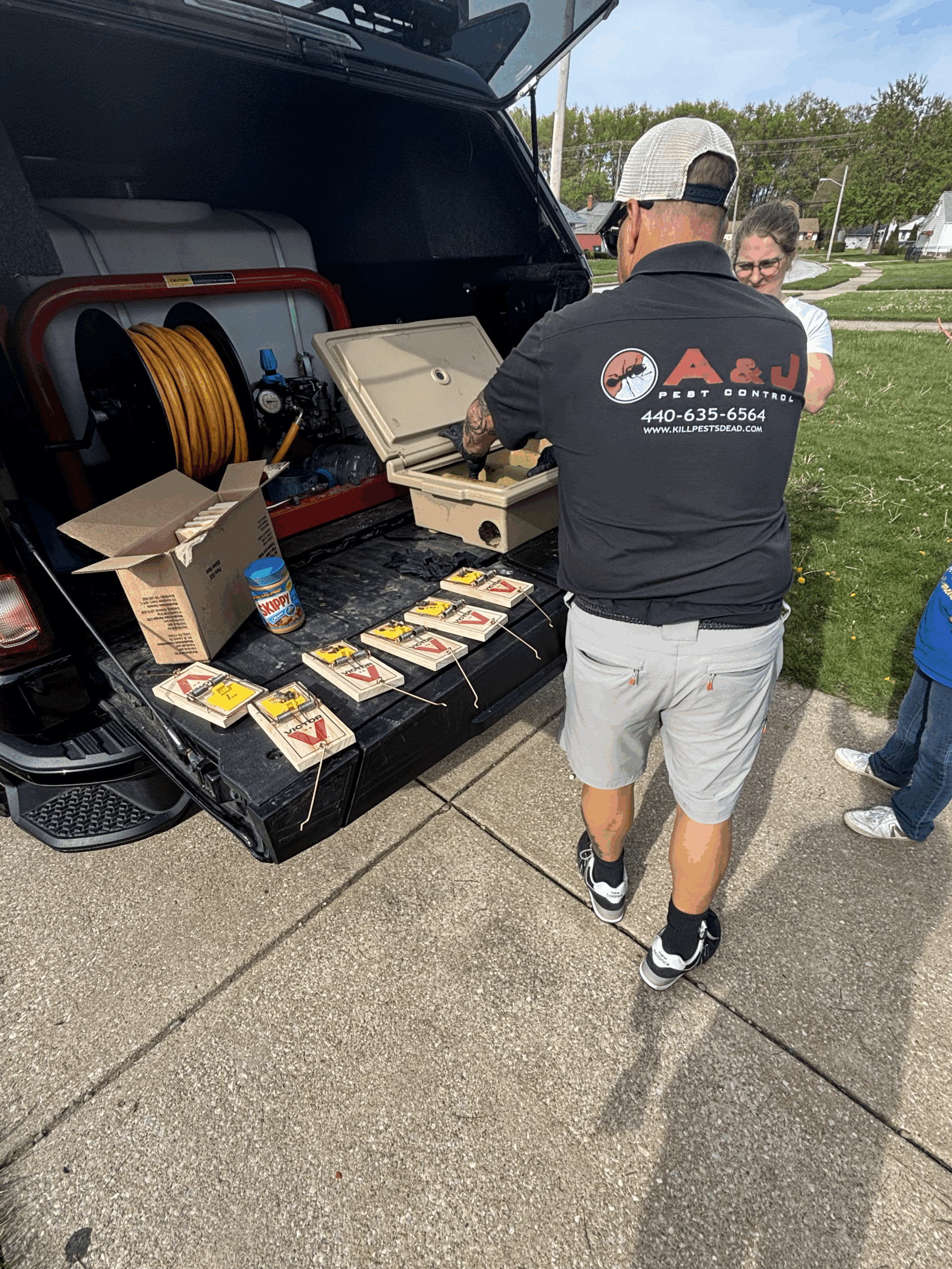 A&J Pest Control professional technician with equipment